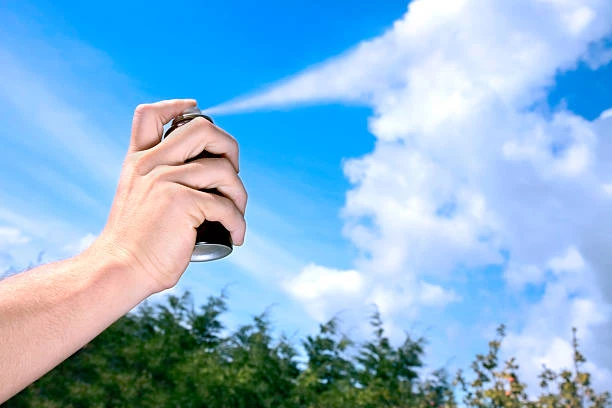 Spray from aerosol merging with clouds